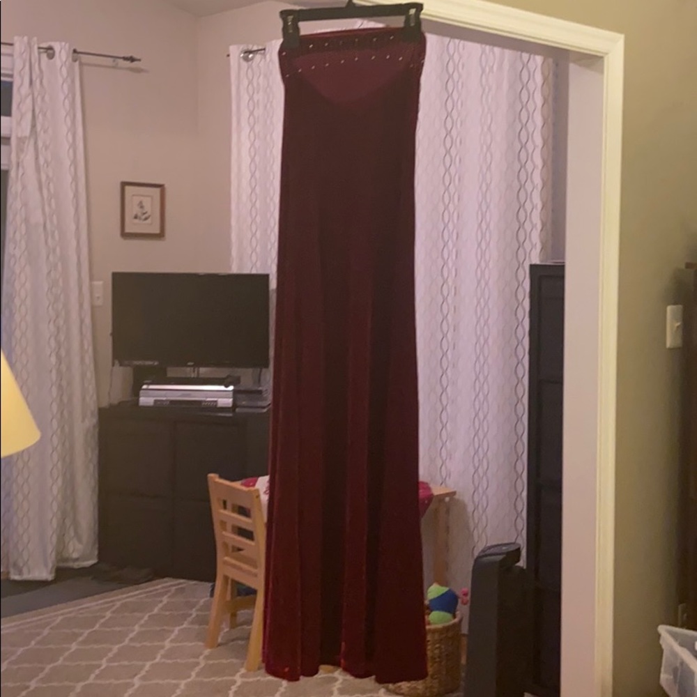 Red, strappless, warm prom dress